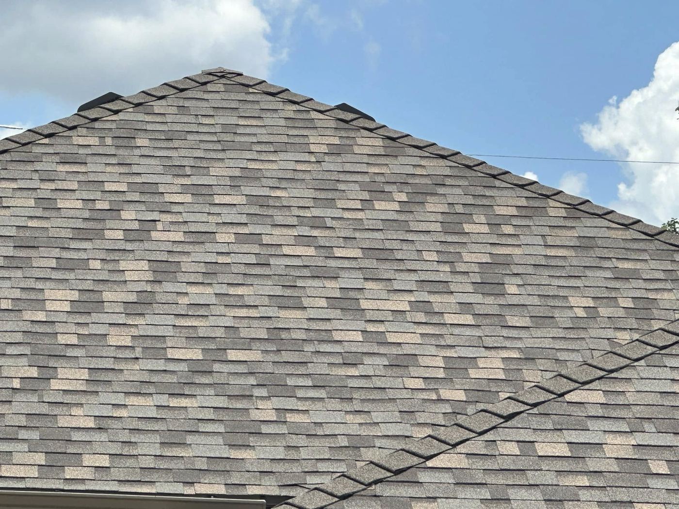 Drone imagery of a roof with AI-detected damage marked